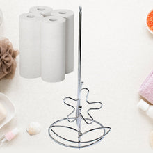 Steel napkin holder with a roll of tissue paper.