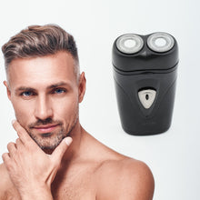 Travel-friendly electric shaver with flexible shaving heads.