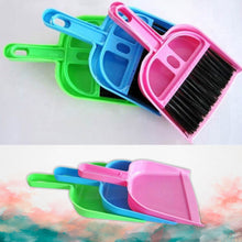 Lightweight dustpan with small broom for easy cleaning.